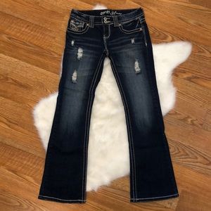 Amethyst distressed boot cut jeans